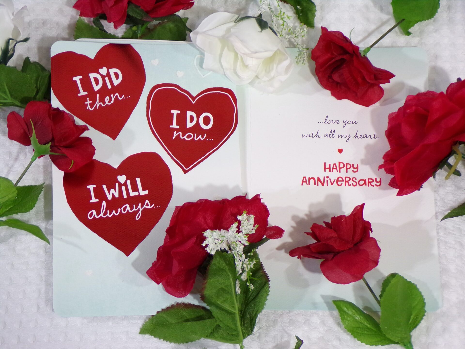 Happy Anniversary card, with flowers on top.