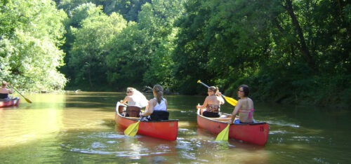 Group of people canoeing in Hocking Hills. 