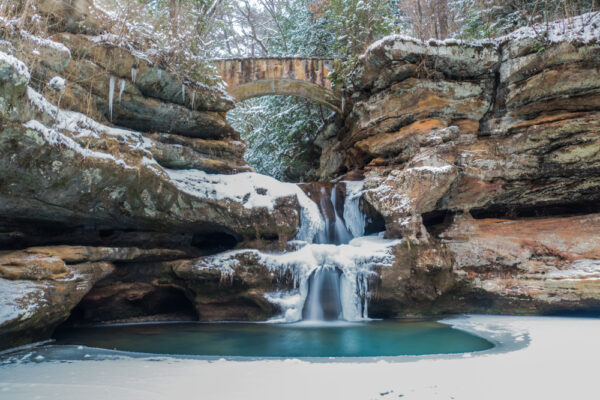 Winter waterfall at Hocking Hills State Park is one of the best things to do in Hocking Hills This winter