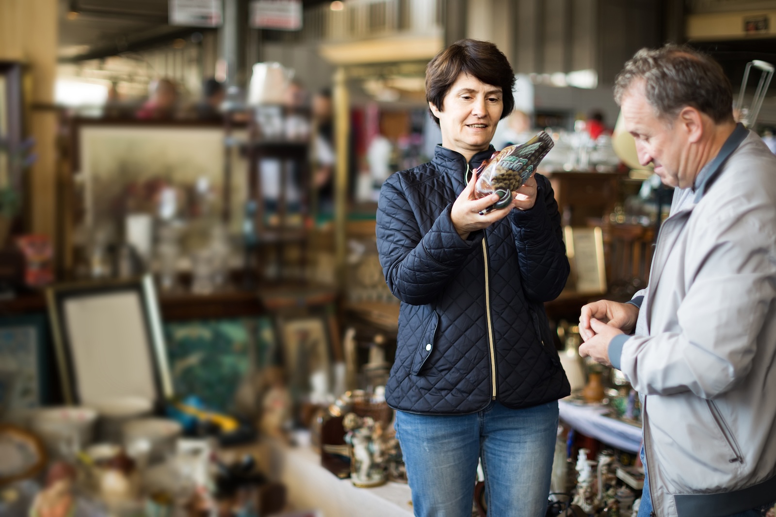 couple out in an antique store, one of the best things to do in Hocking Hills besides hiking