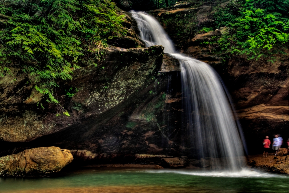 Romantic couple enjoying Hocking Hills State Park during their Hocking Hills Honeymoon at our private cabins