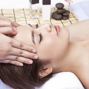 Woman relaxing in spa. 